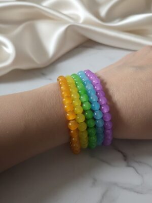 Rainbow beaded bracelet stack with colorful jelly beads