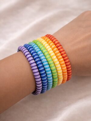 Rainbow stack bracelet with colorful polymer clay beads.