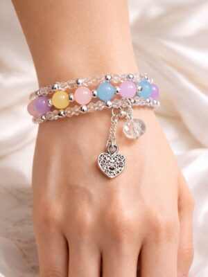Cute beaded bracelet with pastel beads and charm
