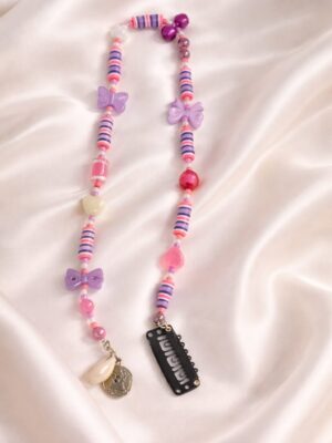 Cute pink hair extension with butterfly charms