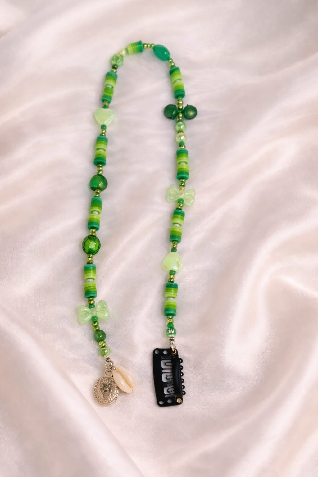 Green hair accessory with beaded design, bow and crystal handmade hair extension