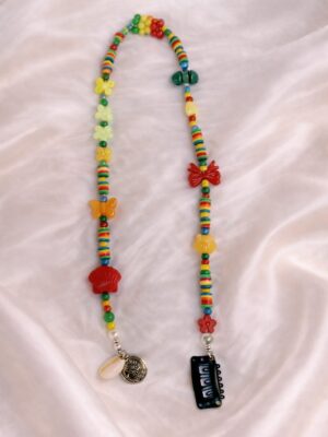 Colorful hair extension with multicolor beads and boho festival style